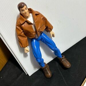 Action Figure with Brown Jacket and Blue Pants
